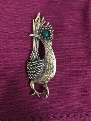 Pájaro corredor de carretera vintage firmado por embajador color oro o bronce ojo de piedra verde  Foto 1 de 2