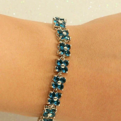 Браслет с голубым топазом круглой огранки 7 карат с покрытием из белого золота 14 карат 925 - Изображение 1 из 3