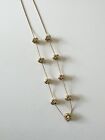 Gold Tone 30” Long Delicate Love Knot Necklace