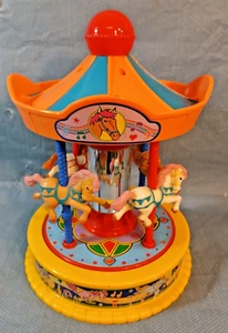 VINTAGE 1991 REDBOX 23137 TOY MUSICAL WIND UP MERRY GO ROUND IT'S A SMALL WORLD - Picture 1 of 6