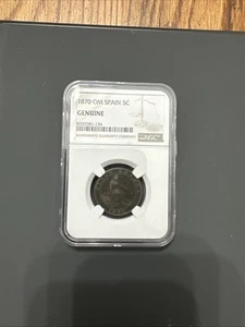 1870 OM Spain 5 Centimos - NGC Genuine - Bronze Seated Hispania Coin - Picture 1 of 4