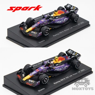 Spark 1:64 Oracle RB Racing RB19 No.1 / No.11 Diecast Model Car - Image 1 of 4