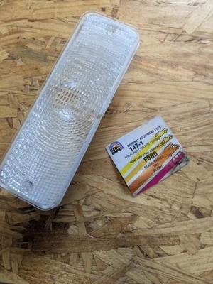 NOS 1980-1986 Ford F Series & Bronco Clear Front Turn Signal fits left or right - Image 1 of 4