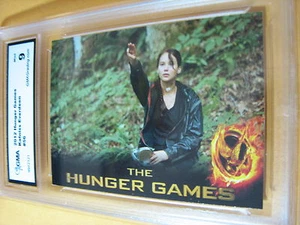 KATNISS EVERDEEN 2012 LOS JUEGOS DEL HAMBRE #56 GRADO 9 L@@K - Imagen 1 de 1