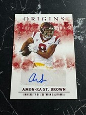 2021 Panini Chronicles Origins Draft Picks Amon-Ra St. Brown Rookie Auto Red /75