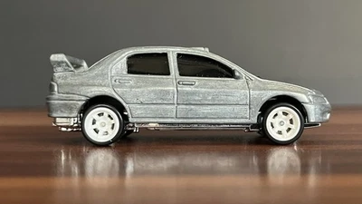 RARE Hot Wheels Factory Raw Unpainted Unspun Mitsubishi Lancer Evolution VHTF  - Image 1 of 4