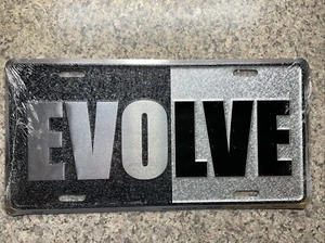 EVOLVE License Plate BRAND NEW IN WRAP - Imagen 1 de 4