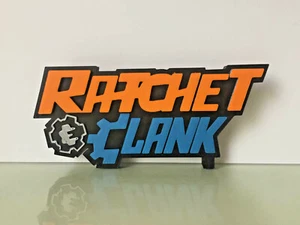 Ratsche und Clank Logo Videospiel Sammlerstück Display Symbol selbststehend Retro RC - Bild 1 von 3