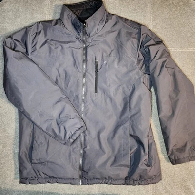 Chaqueta acolchada grande Izod gris reversible Ripstop negra para hombre Foto 1 de 4