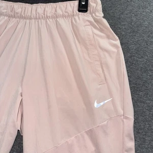 Pantalones de Correr Nike Para Mujer L Rosa Cónicos Elastizados Cremallera Tobillo Atléticos DH6875-601 - Imagen 1 de 16