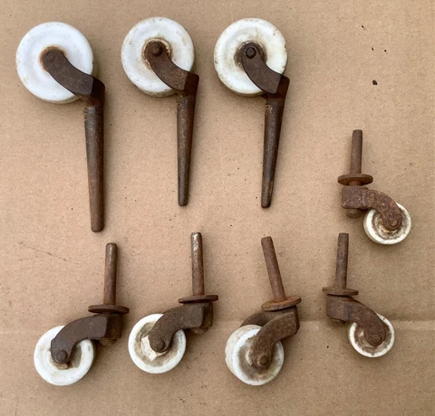 Lot of 8 Antique Vintage Cast Iron Porcelain Casters with Stems Different Sizes Cover