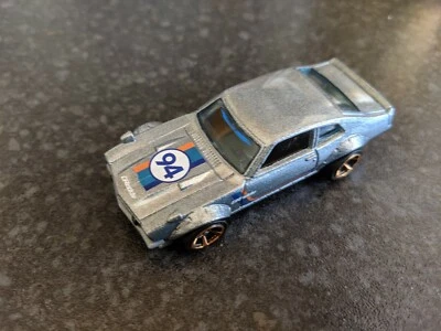 Hot Wheels FYF86	2019	Muscle Mania	1/10	Ford	Custom Maverick	98/250	 - Image 1 of 4