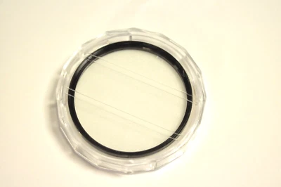 Kalt 77mm spot-soft focus filter with plastic case. - Image 1 of 4