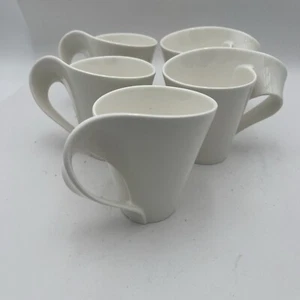 Juego de 5 tazas Villeroy & Boch New Wave porcelana blanca mango trenzado usadas en excelente estado - Imagen 1 de 10