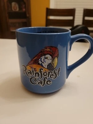 Rainforest Café vintage 20 oz. Taza de café grande Blue Rio Parrot 2000 Foto 1 de 4