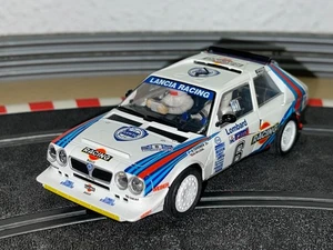 1548- Scalextric SCX LANCIA DELTA S4 #6 Toivonen Lombard Racing slot car 1:32 - Imagen 1 de 3
