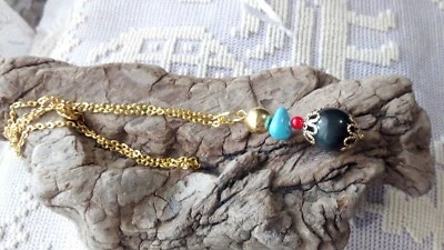 Su Coccu collana argento dorato sardo con pendente onice nero portafortuna sardo - Immagine 1 di 2