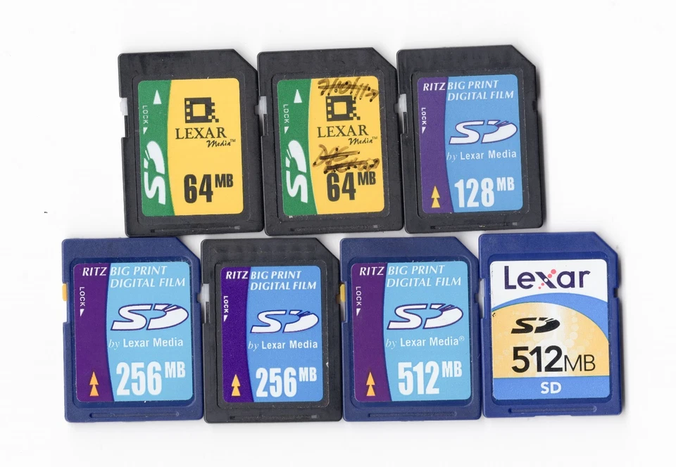 Lot Of 7x Lexar 64MB / 128MB / 256MB / 512MB MEGABYTE SD Camera Memory Cards - Image 1 of 1