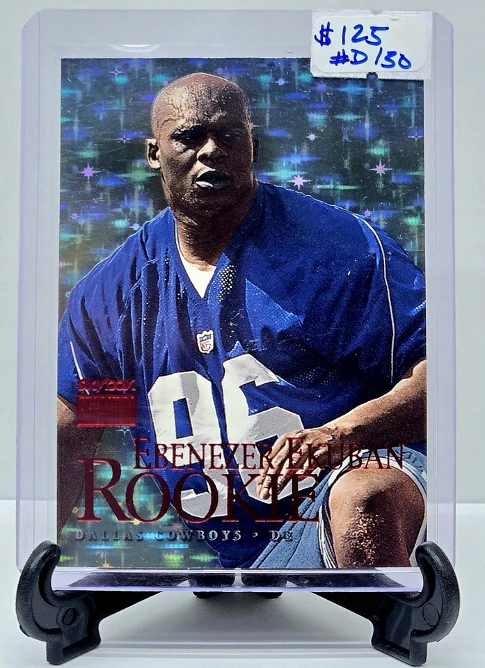 1999 SKYBOX PREMIUM EBENEZER EKUBAN ROOKIE STAR RUBIES EXTREME #D /30 COWBOYS - Image 1 of 1