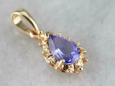 Colgante lágrima tanzanita azul corte pera de 2 quilates acabado oro amarillo de 14 quilates cadena gratis Foto 1 de 4