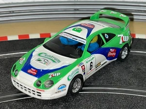 1296- Scalextric SCX Toyota Celica #6 7up Ponce Leon Rally El Corte Inglés slot - Bild 1 von 3