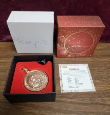 Moneda de plata Camerún 2021 500 francos signos del zodiaco con oro rosa en bisel Escorpio Foto 1 de 4