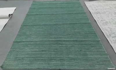 Alfombra de encuadernación dañada verde claro 6'-0" x 9'-0" precio reducido 1172784145 VSN606X-6 Foto 1 de 4