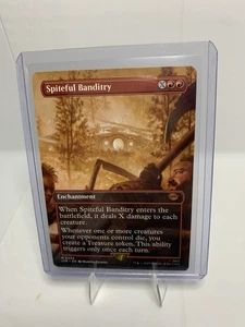 Spiteful Banditry (Borderless) Universes Beyond: The Lord of the Rings: Tales of - Imagen 1 de 2