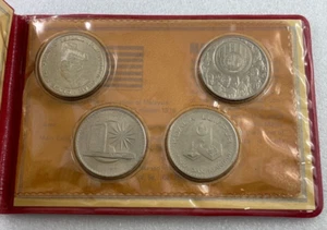 1969-76 Commemorative Malaysia Dollars in World Monetarium Set - Picture 1 of 5