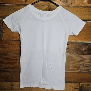T-shirt Athleta Momentum senza cuciture atletica manica corta donna XXS bianca nuova senza etichette - Foto 1 di 7