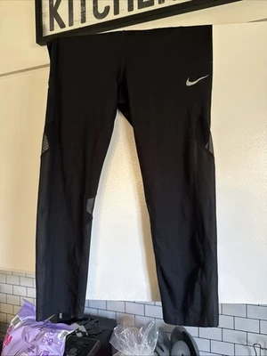 Nike Women Running Leggings with MESH panel Zip Pocket Black Size L - Image 1 of 4