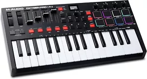 M-Audio Oxygen Pro Mini – 32 Key USB MIDI Keyboard Controller With Beat Pads, & - Picture 1 of 7