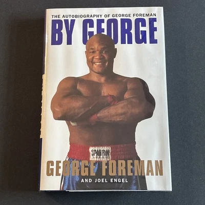 By George George Foreman Autobiography SIGNED First Edition HC Boxing w/ Mylar - Image 1 of 4