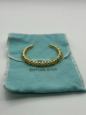 TIFFANY & CO. VINTAGE 18 KARAT GOLD RIBBED CUFF BRACELET - Image 1 of 4