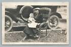 Young Mother Holding Baby on Wicker Rocking Chair RPPC Antique Photo 1920s