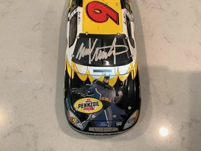 MARK MARTIN AUTOGRAPHED 2004 FORD TAURUS PENNZOIL BATMAN DIECAST & CARD - Image 1 of 4