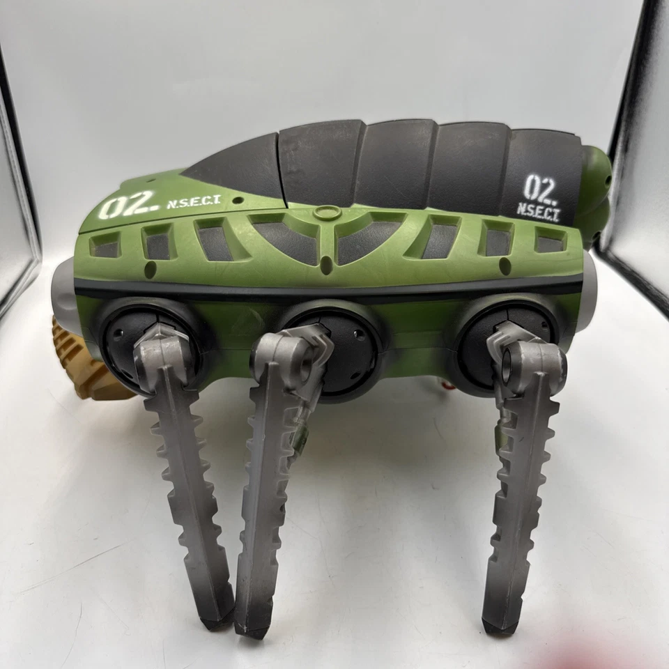 Tyco RC I.N.S.E.C.T. de colección Robot criatura verde y control remoto Foto 1 de 4