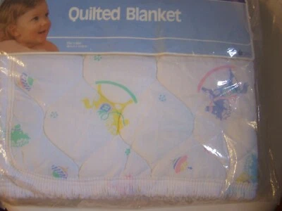 VINTAGE CURITY QUILTED BLANKET WHITE PASTEL ROCKING HORSES SEALED NOS 1988 - Image 1 of 2