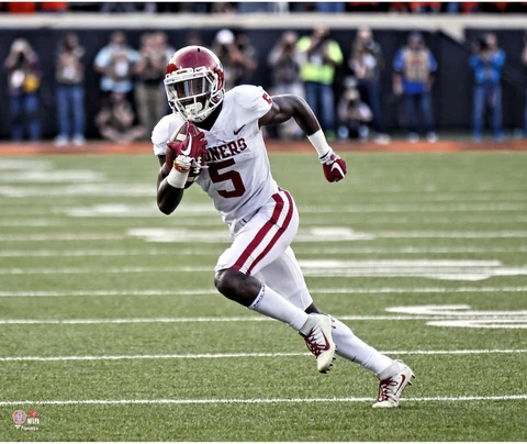 Marquise Brown Oklahoma Sooners Unsigned White Jersey Running Photograph Cover