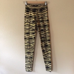 Black Gold Leggings XS Jrs Girls 8 10 Tribal Aztec Metallic Print Costume - Picture 1 of 3