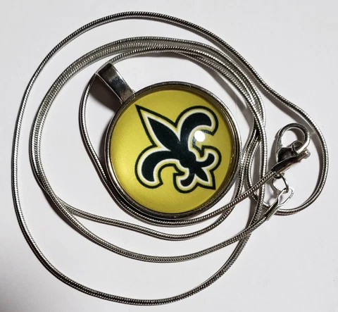 NFL--NEW ORLEANS SAINTS-NEW--1" Diameter LOGO/CHARM and 24" SNAKE CHAIN NECKLACE Cover