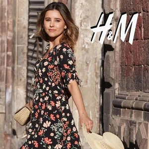 H&M Damen-Minikleid 6 schwarz mehrfarbig Blumenmuster Fit & Flare Knopfleiste - Bild 1 von 16