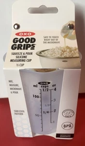 OXO GOOD GRIPS MINI SQUEEZE & POUR SILICONE MEASURING CUP 4 OUNCES - Picture 1 of 6