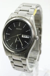 SEIKO 7N43-9090 Titanium Black Dial Day Date KANJI Watch 38mm wrist size 6.7" - Picture 1 of 12