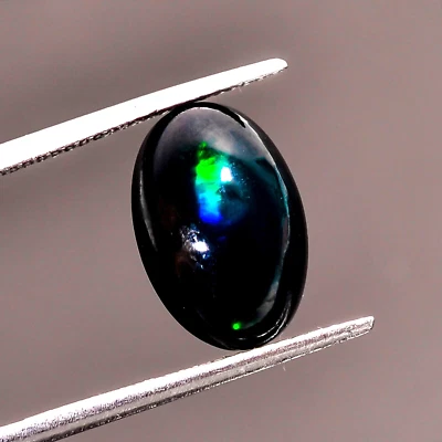 Piedra preciosa suelta cabujón forma ovalada ópalo etíope negro natural 3,5 quilates 13X9X5 mm Foto 1 de 3