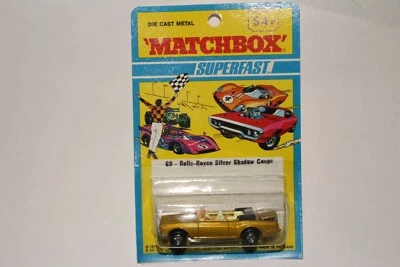 MATCHBOX SUPERFAST #69 ROLLS ROYCE SILVER SHADOW CONVERTIBLE, GOLD, NEW IN PACK - Image 1 of 4