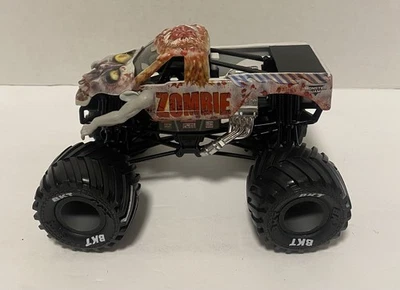 Hot Wheels Zombie Black Wheels Silver Rims Monster Jam Truck 1:24  - Image 1 of 4