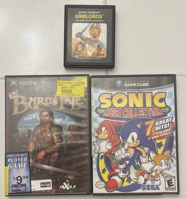 Lote de 3 videojuegos mixtos Xbox The Bards Tale Atari Warlords Sega Game Cube Sonic Foto 1 de 3