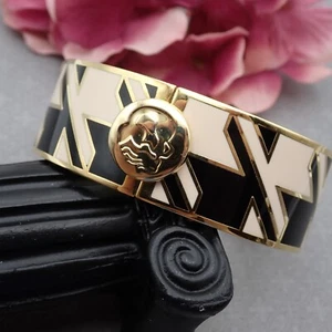 Abstract Black Cream Enamel Spartina 449 7" Hinged Gold Tone Bangle Bracelet - Picture 1 of 7