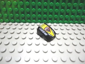 Lego 1 Black 2x2 printed sloped brick block with Life preserver design - Picture 1 of 1